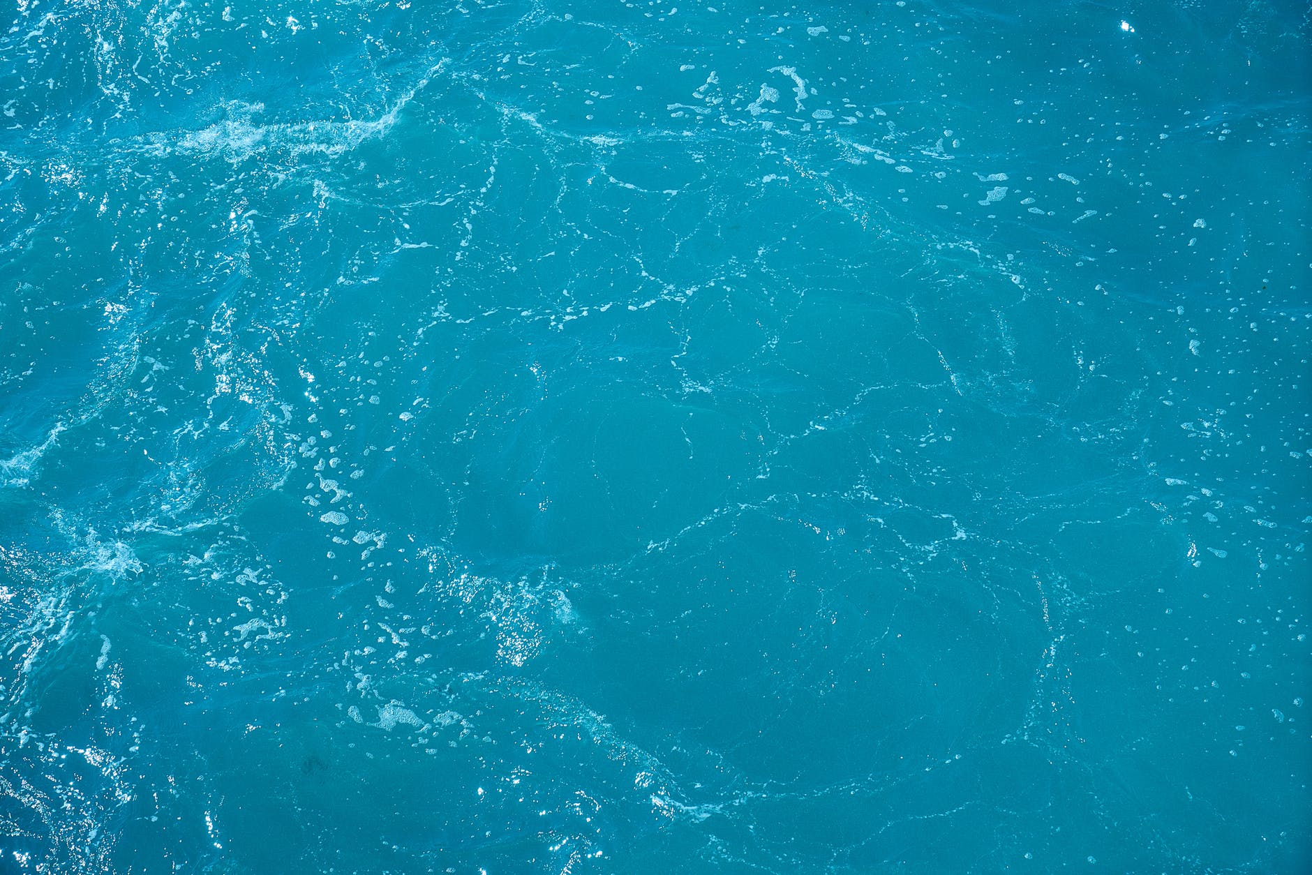 close up photo of blue body of water